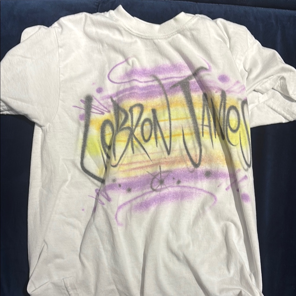 White Graphic T-Shirt with Purple and Yellow Accents